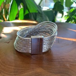 Silver twisted pleather bangle bracelet